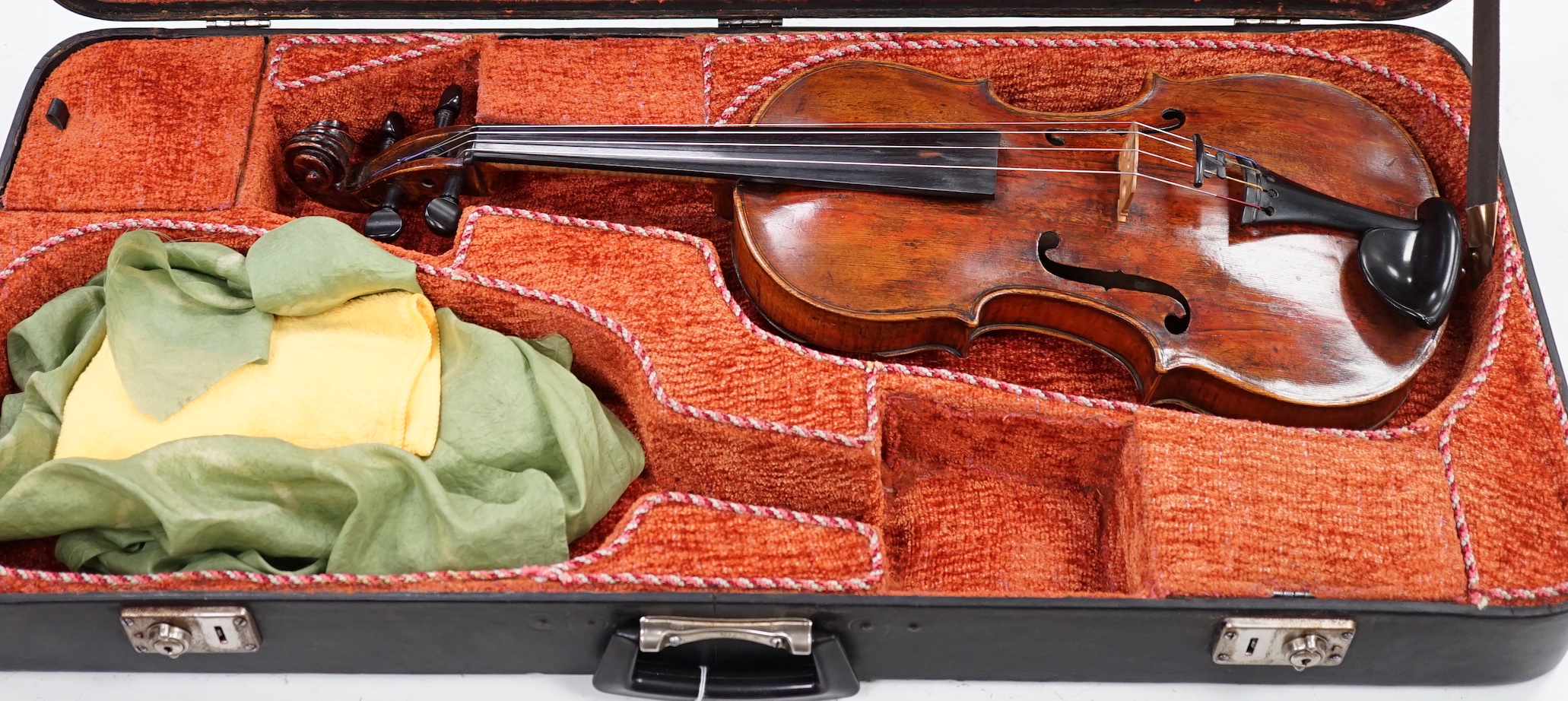 A cased 19th century German viola, length of body 39cm, in a good double case incorporating space for violin, without bow